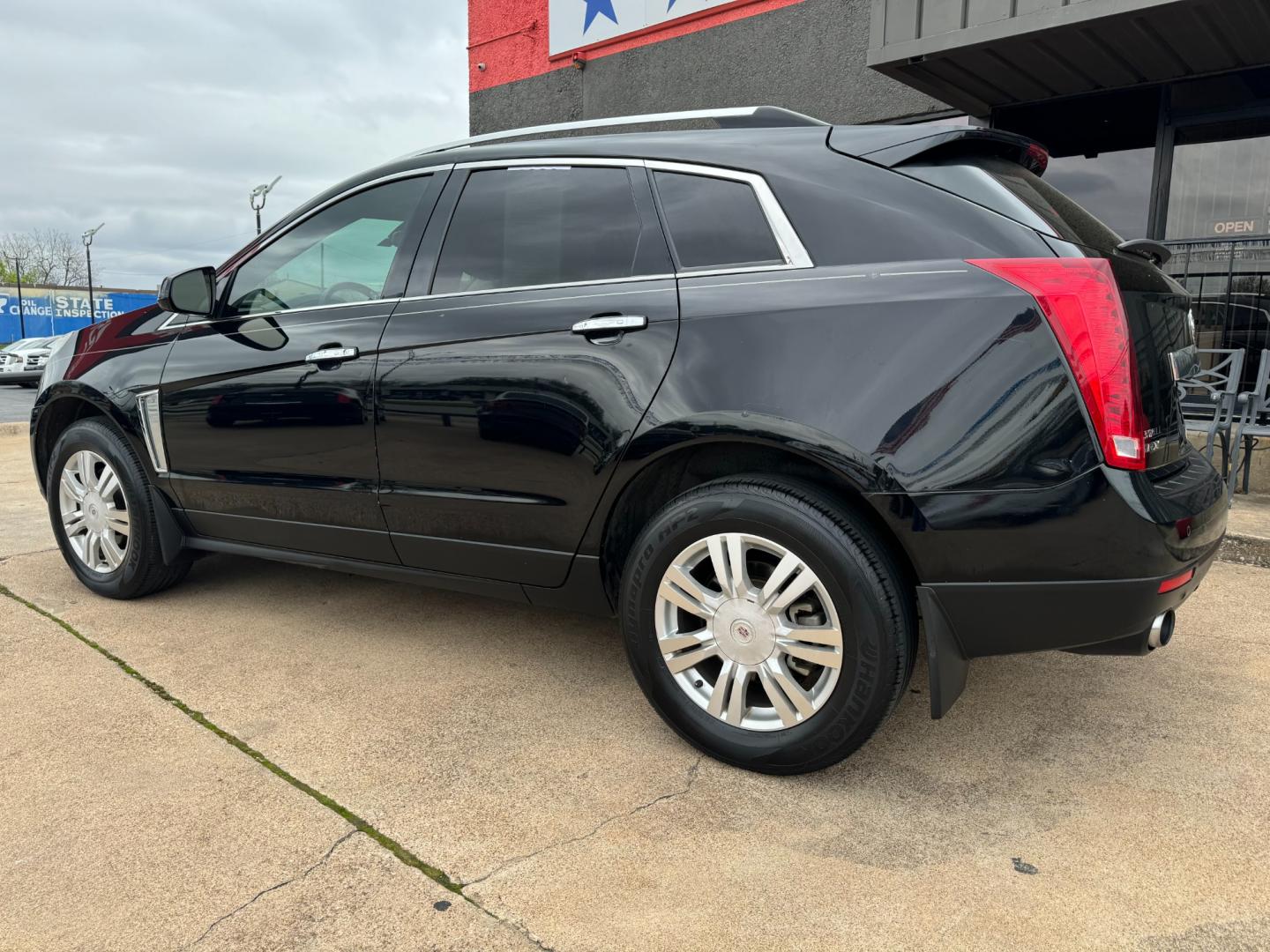 2013 BLACK CADILLAC SRX LUXURY (3GYFNCE36DS) , located at 5900 E. Lancaster Ave., Fort Worth, TX, 76112, (817) 457-5456, 0.000000, 0.000000 - This is a 2013 CADILLAC SRX 4 DOOR SUV that is in excellent condition. There are no dents or scratches. The interior is clean with no rips or tears or stains. All power windows, door locks and seats. Ice cold AC for those hot Texas summer days. It is equipped with a CD player, AM/FM radio, AUX port, - Photo#6